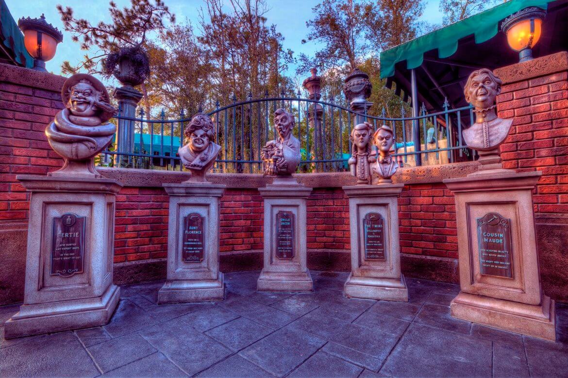 Five busts outside of the Haunted Mansion at Disneyland